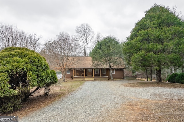 ranch-style home with a porch