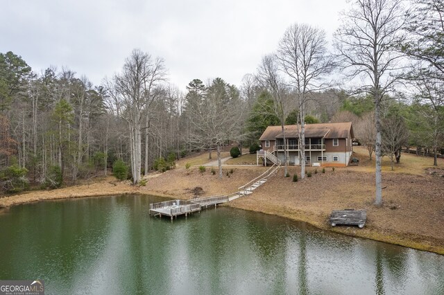 dock area with a deck with water view