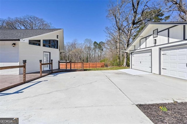 view of property exterior featuring a garage