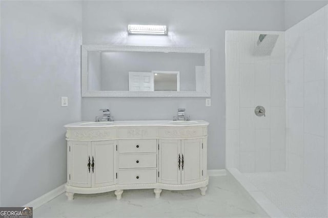 bathroom with vanity and walk in shower