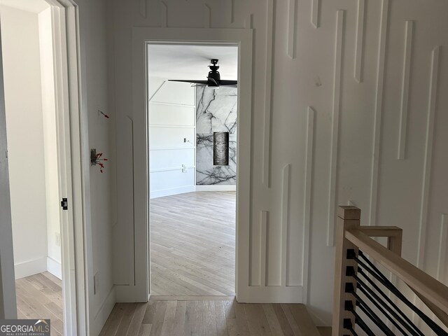 corridor featuring light hardwood / wood-style flooring