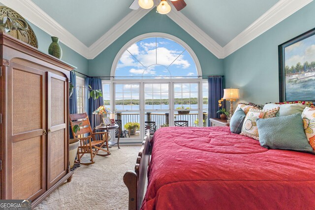 bedroom with a water view, vaulted ceiling, access to outside, and ceiling fan