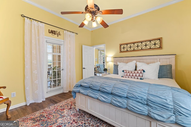 bedroom featuring ceiling fan, dark wood-type flooring, and ornamental molding