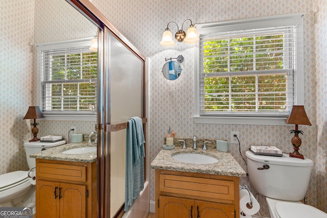 bathroom with toilet and vanity