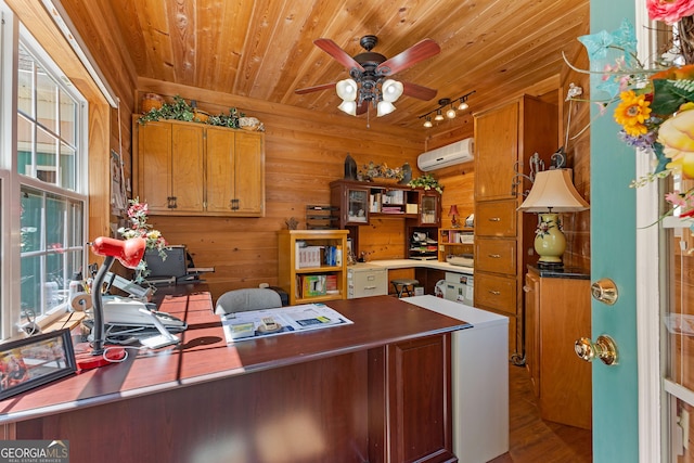 home office featuring ceiling fan, an AC wall unit, a wealth of natural light, and wooden ceiling