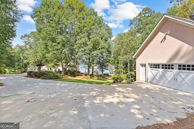 view of property exterior with a garage