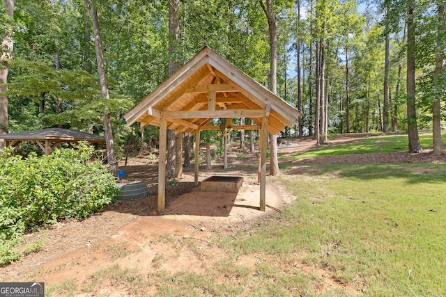 view of home's community with a yard