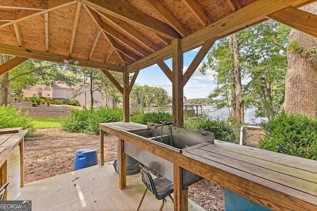 view of patio / terrace featuring a water view