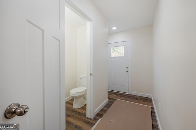 doorway featuring dark hardwood / wood-style floors