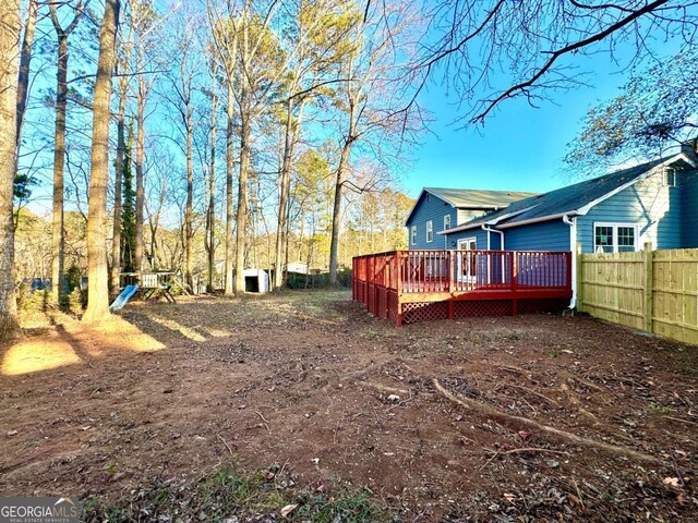 view of yard featuring a deck