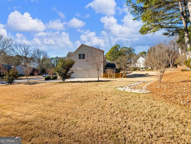 view of yard with a garage