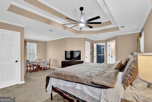 bedroom with light colored carpet, a raised ceiling, ceiling fan, and crown molding