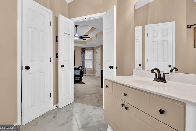 bathroom featuring vanity and ceiling fan