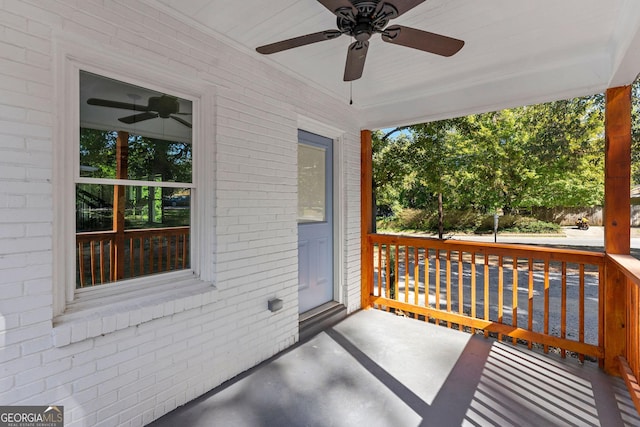 exterior space featuring ceiling fan and a porch