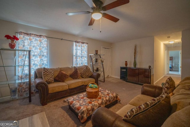 living room featuring ceiling fan