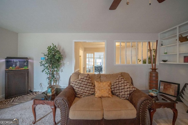 living room featuring ceiling fan