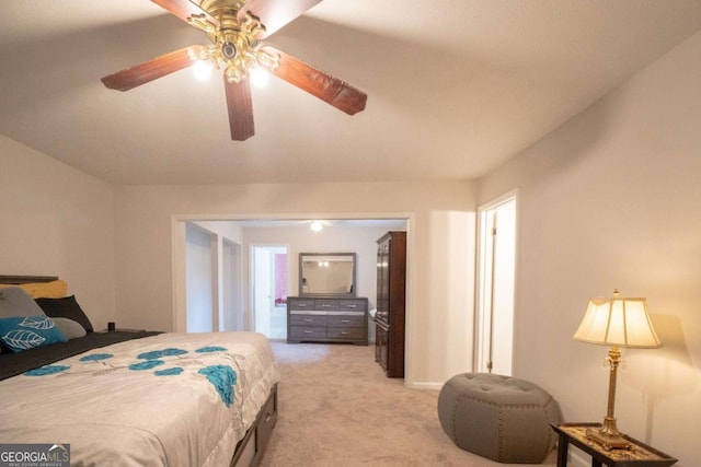 bedroom with ceiling fan and light colored carpet