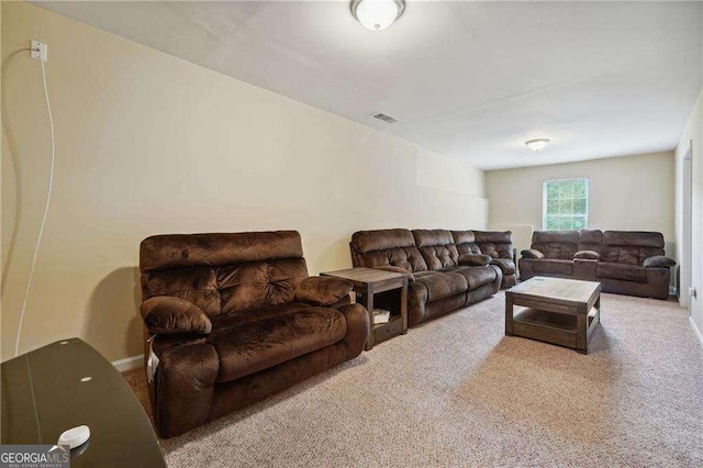 living room featuring light colored carpet