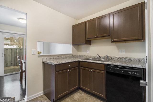 kitchen with dark brown cabinets, black dishwasher, and sink