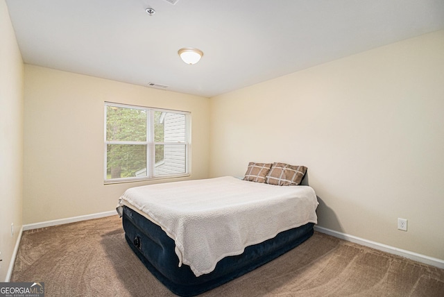 257 Country Club Dr, Jonesboro, GA 30238 - carpeted bedroom with baseboards