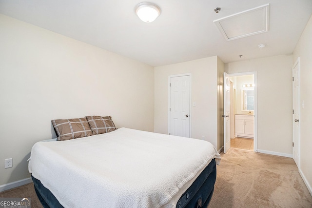 257 Country Club Dr, Jonesboro, GA 30238 - bedroom with light colored carpet, baseboards, attic access, and ensuite bath