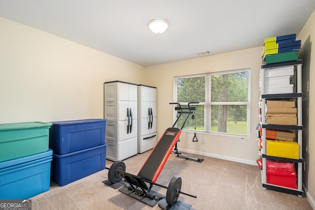 257 Country Club Dr, Jonesboro, GA 30238 - exercise area featuring baseboards and light carpet