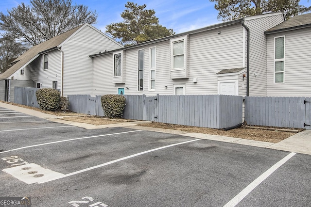 257 Country Club Dr, Jonesboro, GA 30238 - view of front of property featuring uncovered parking and fence