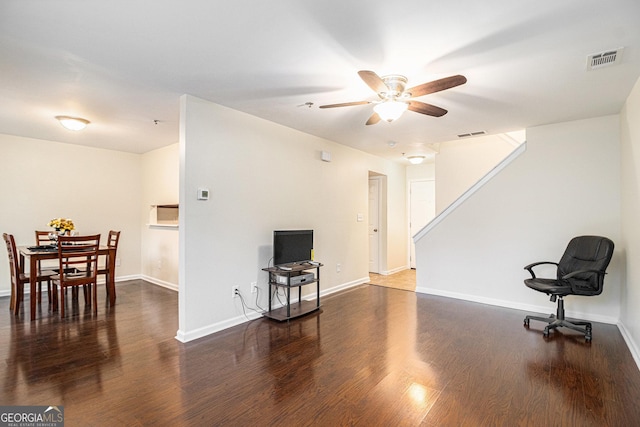 257 Country Club Dr, Jonesboro, GA 30238 - unfurnished living room with ceiling fan, wood finished floors, baseboards, and stairs