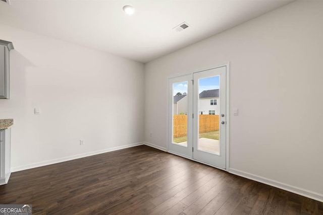 interior space with dark hardwood / wood-style floors