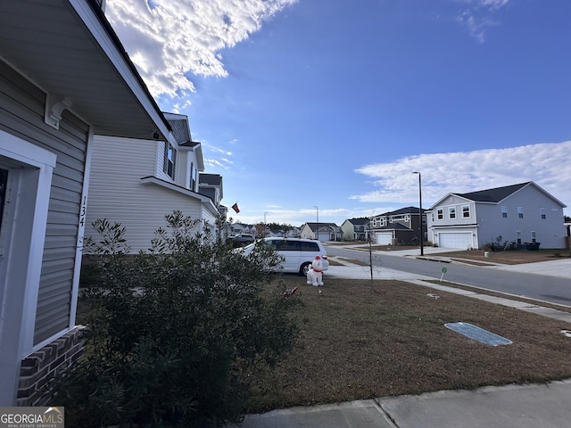 view of yard with a garage