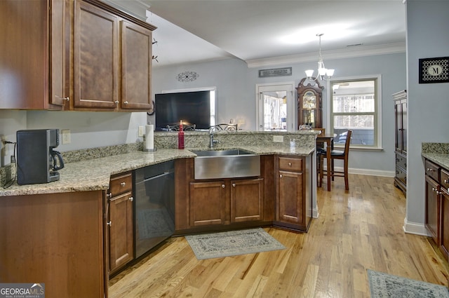 kitchen featuring dishwasher, light stone counters, kitchen peninsula, and sink