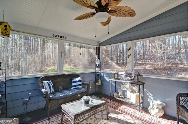 sunroom with vaulted ceiling and ceiling fan