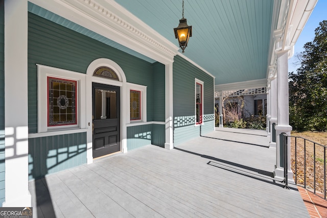 wooden deck featuring a porch