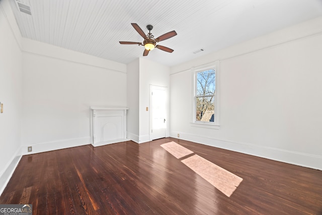 empty room featuring hardwood / wood-style flooring and ceiling fan