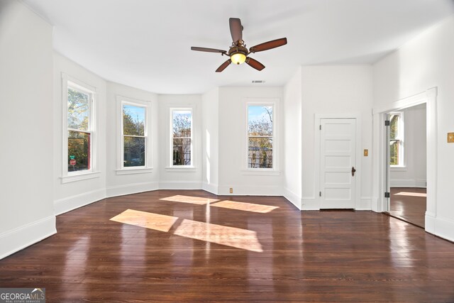 198 Dearing St, Athens, GA 30605 - unfurnished living room with visible vents, baseboards, wood finished floors, and ceiling fan