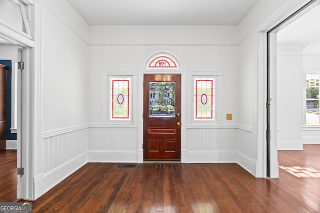 foyer with dark hardwood / wood-style flooring