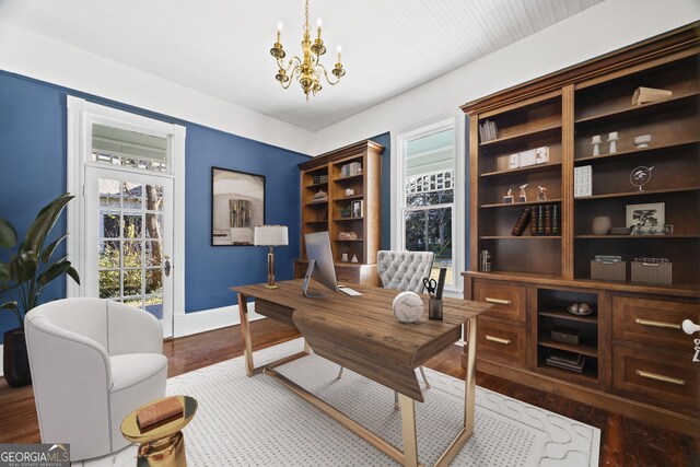 198 Dearing St, Athens, GA 30605 - home office featuring an inviting chandelier, dark wood-style flooring, and baseboards