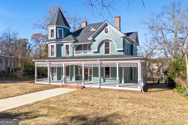 198 Dearing St, Athens, GA 30605 - view of front of property with a porch and a front lawn