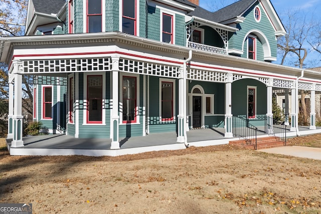 view of home's exterior with covered porch