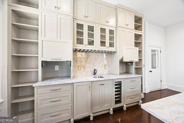 198 Dearing St, Athens, GA 30605 - kitchen featuring wine cooler, open shelves, backsplash, a sink, and baseboards
