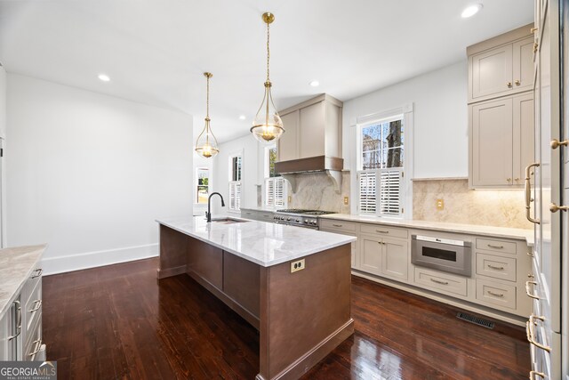198 Dearing St, Athens, GA 30605 - kitchen with dark wood finished floors, a sink, stainless steel microwave, wall chimney exhaust hood, and range