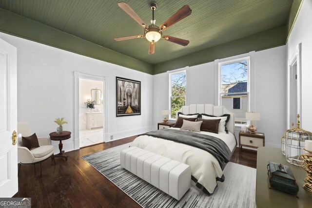 198 Dearing St, Athens, GA 30605 - bedroom with connected bathroom, wood-type flooring, and ceiling fan
