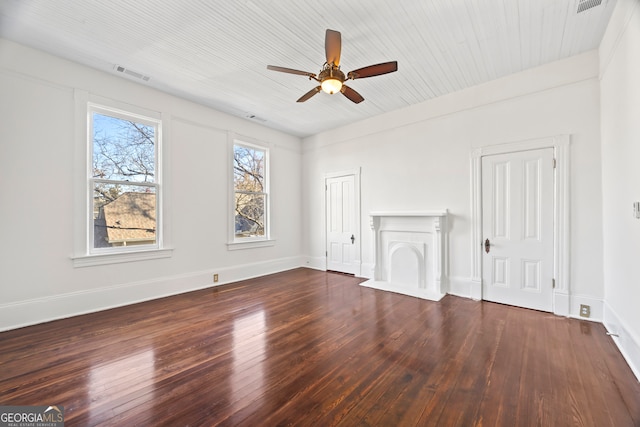 interior space featuring ceiling fan, dark wood-type flooring, and wood ceiling