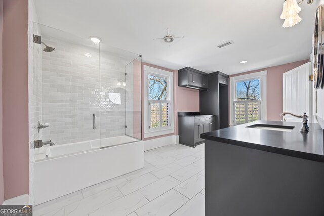 198 Dearing St, Athens, GA 30605 - bathroom featuring shower / bath combination with glass door, baseboards, visible vents, marble finish floor, and vanity