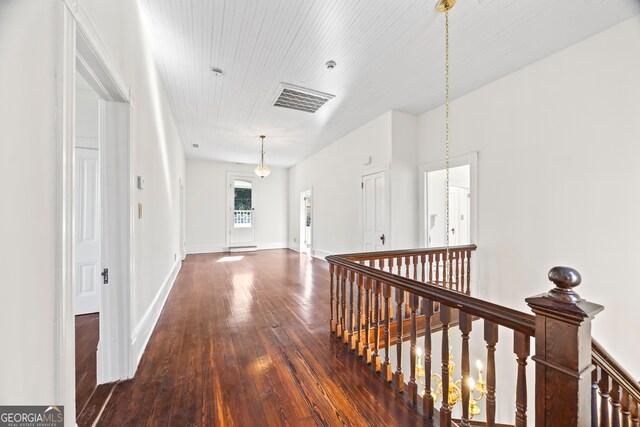 198 Dearing St, Athens, GA 30605 - corridor with baseboards, visible vents, an upstairs landing, and wood-type flooring