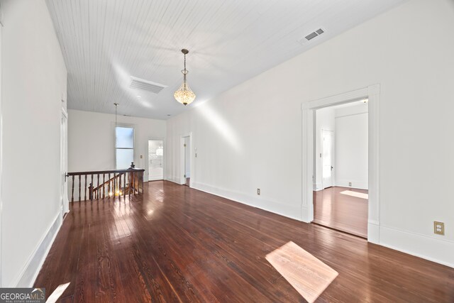 198 Dearing St, Athens, GA 30605 - unfurnished living room featuring hardwood / wood-style flooring, baseboards, and visible vents