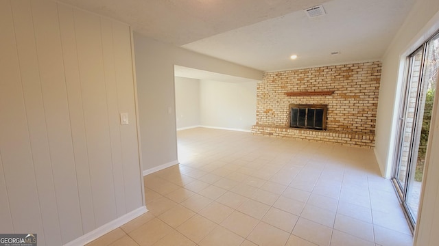 unfurnished living room with a fireplace