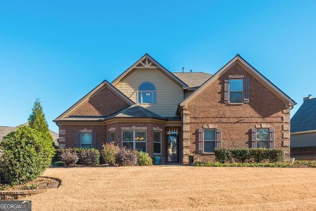 view of front of house featuring a front lawn