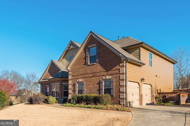 view of front of property with a garage