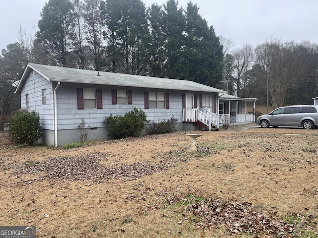 ranch-style house featuring crawl space and a porch